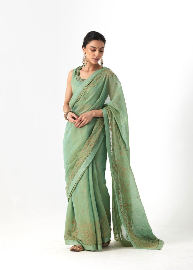 Krisha - A sage green tissue chanderi hand embroidered saree with tonal embroidered blouse