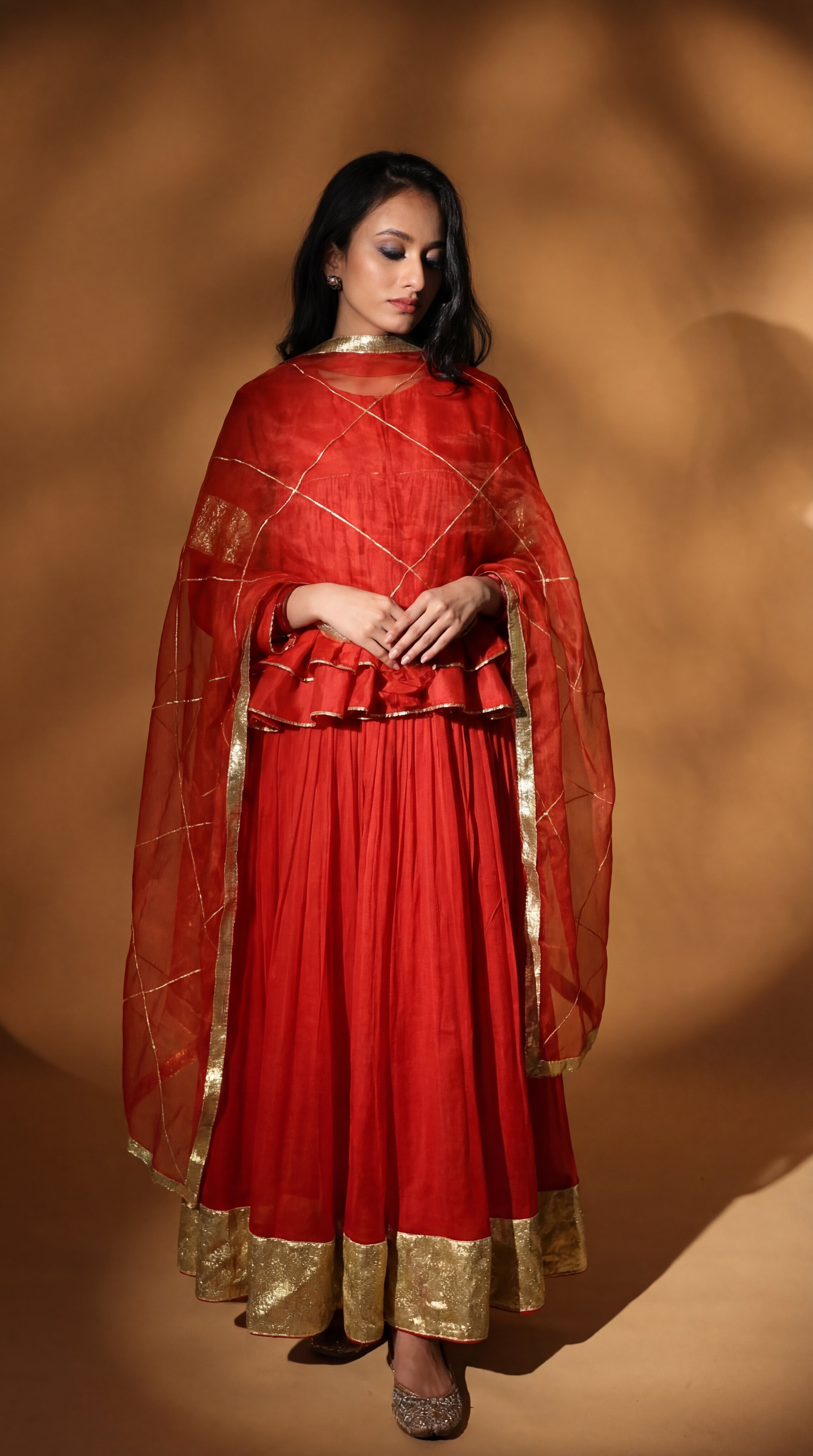 Nidhi | Burnt Orange Organza silk Lehenga with Gota and Ari-Zardozi Embroidery