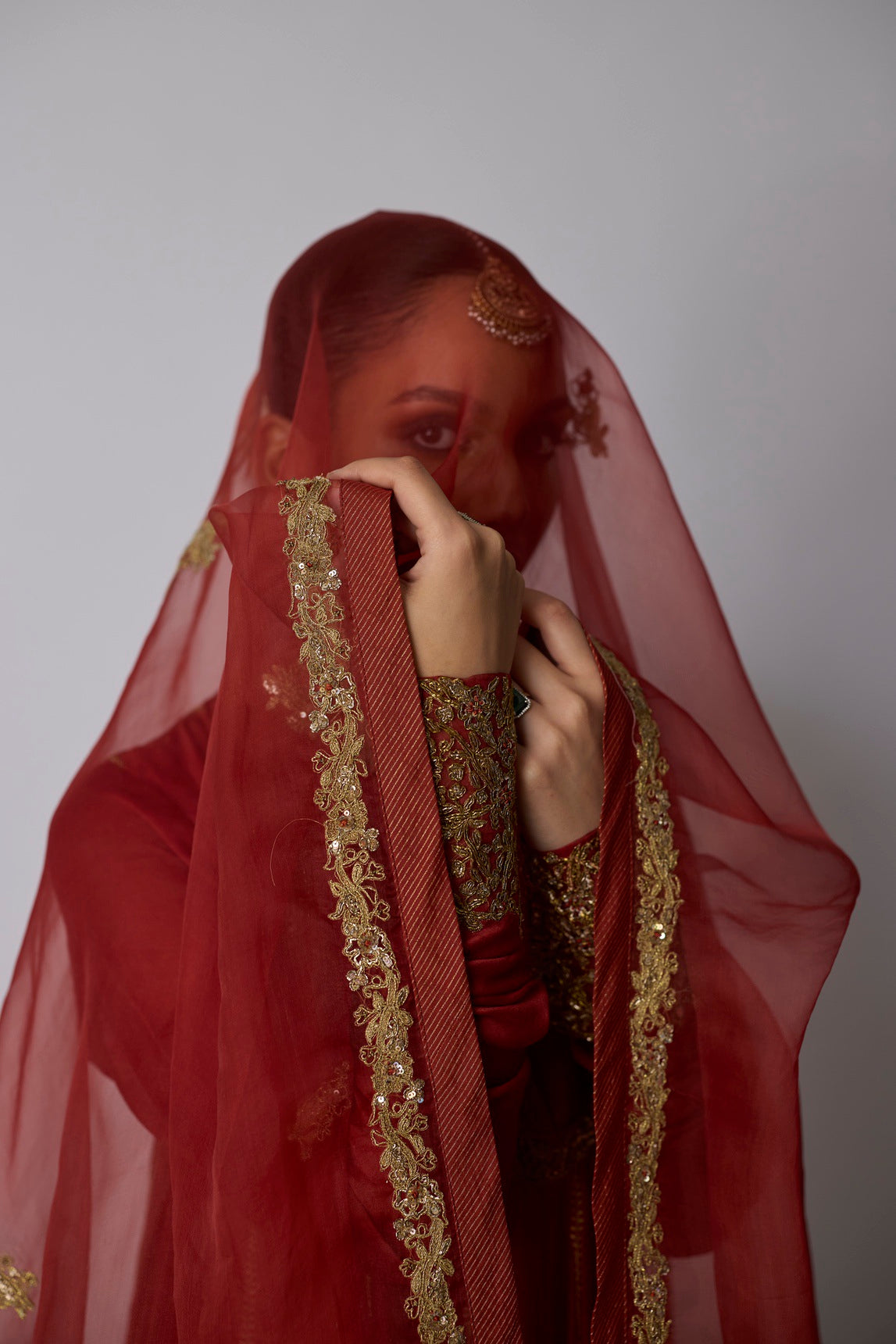 Madhavi |Rust red chanderi anarkali and sharara with an organza dupatta