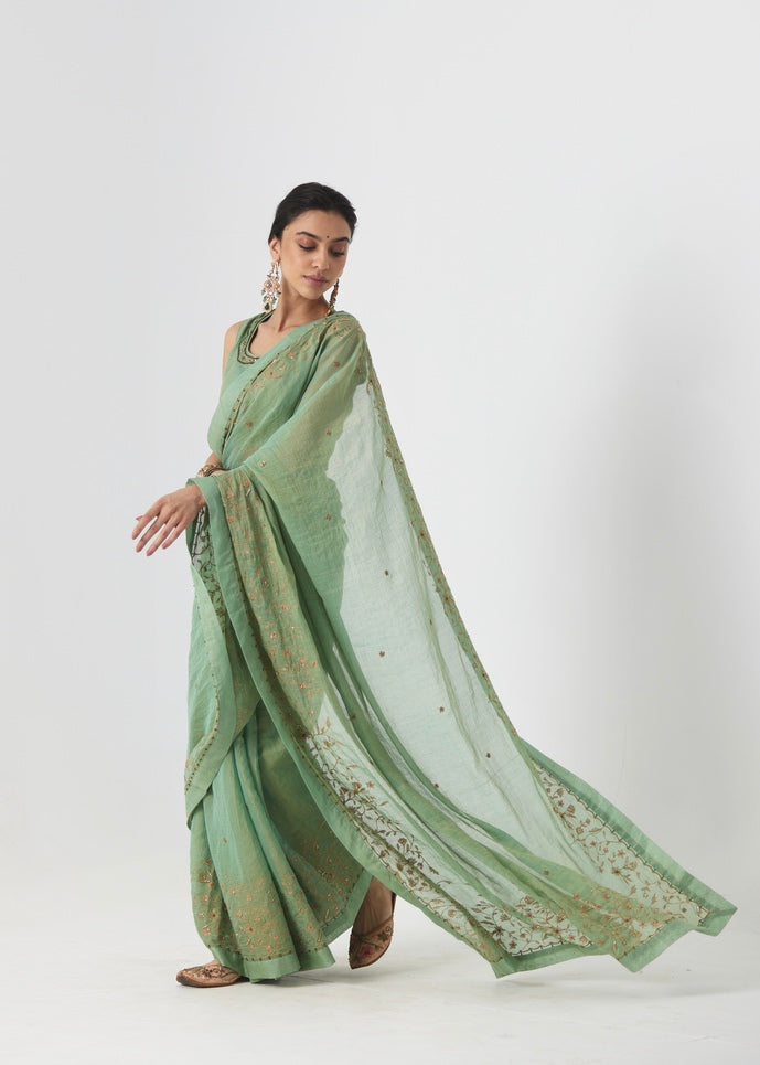 Krisha - A sage green tissue chanderi hand embroidered saree with tonal embroidered blouse