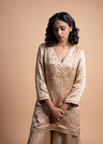 Load image into Gallery viewer, Tashi - Beige-Gold Sharara Suit Set with a Satin Top, Adorned with Handcrafted Ari-Zardozi Embroidery and Striped Chanderi Facing, Paired with Satin Bottoms and a Delicate Tissue Chanderi Dupatta
