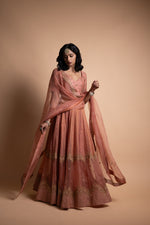 Load image into Gallery viewer, Tira- Peach Chanderi Silk Blouse and Tonal Tissue Chanderi Lehenga with Organza Silk Panels Paired with Banarasi Silk Tissue Dupatta in Handcrafted in Ari-Zardozi Embroidery and Gota Appliques
