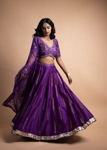 Rani- Purple Chanderi Silk Blouse and Tonal Lehenga Paired with Net Dupatta in Handcrafted in Ari-Zardosi Embroidery and Gota Appliques