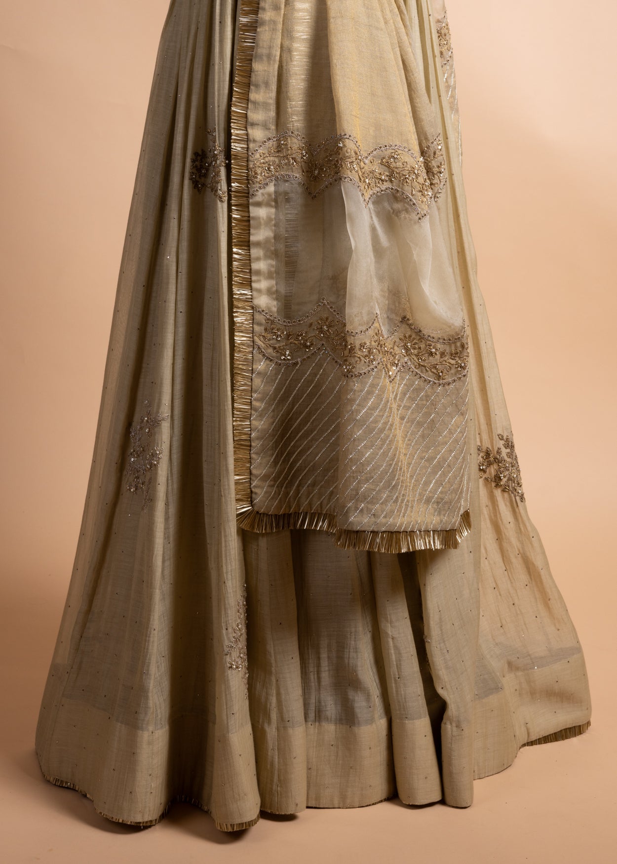 Kira - Soft Green Chanderi Silk Blouse and Tonal Lehenga Paired with Tonal Tissue Chanderi Dupatta Handcrafted in Ari-Zardosi Embroidery