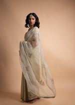 Load image into Gallery viewer, Ahana - Light Green Organza Saree Paired with a Chanderi Blouse and Adorned with Handcrafted Ari-Zardozi Embroidery
