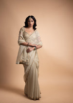 Load image into Gallery viewer, Ahana - Light Green Organza Saree Paired with a Chanderi Blouse and Adorned with Handcrafted Ari-Zardozi Embroidery
