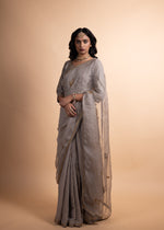 Load image into Gallery viewer, Kriya - Tissue Chanderi and Organza Mukaish Saree, Adorned with Handcrafted Ari-Zardozi Embroidery, Complemented by a Jam Cotton Petticoat and Chanderi Blouse
