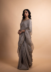 Kriya - Tissue Chanderi and Organza Mukaish Saree, Adorned with Handcrafted Ari-Zardozi Embroidery, Complemented by a Jam Cotton Petticoat and Chanderi Blouse