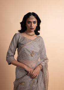 Kriya - Tissue Chanderi and Organza Mukaish Saree, Adorned with Handcrafted Ari-Zardozi Embroidery, Complemented by a Jam Cotton Petticoat and Chanderi Blouse