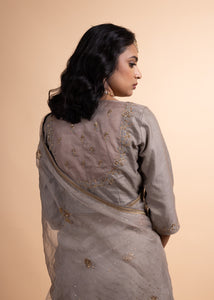 Kriya - Tissue Chanderi and Organza Mukaish Saree, Adorned with Handcrafted Ari-Zardozi Embroidery, Complemented by a Jam Cotton Petticoat and Chanderi Blouse