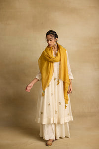 Asin - An ivroy white mul chanderi anarkali with sharara paired with a kota silk dupatta, handcrafted ari and zardosi embroidery