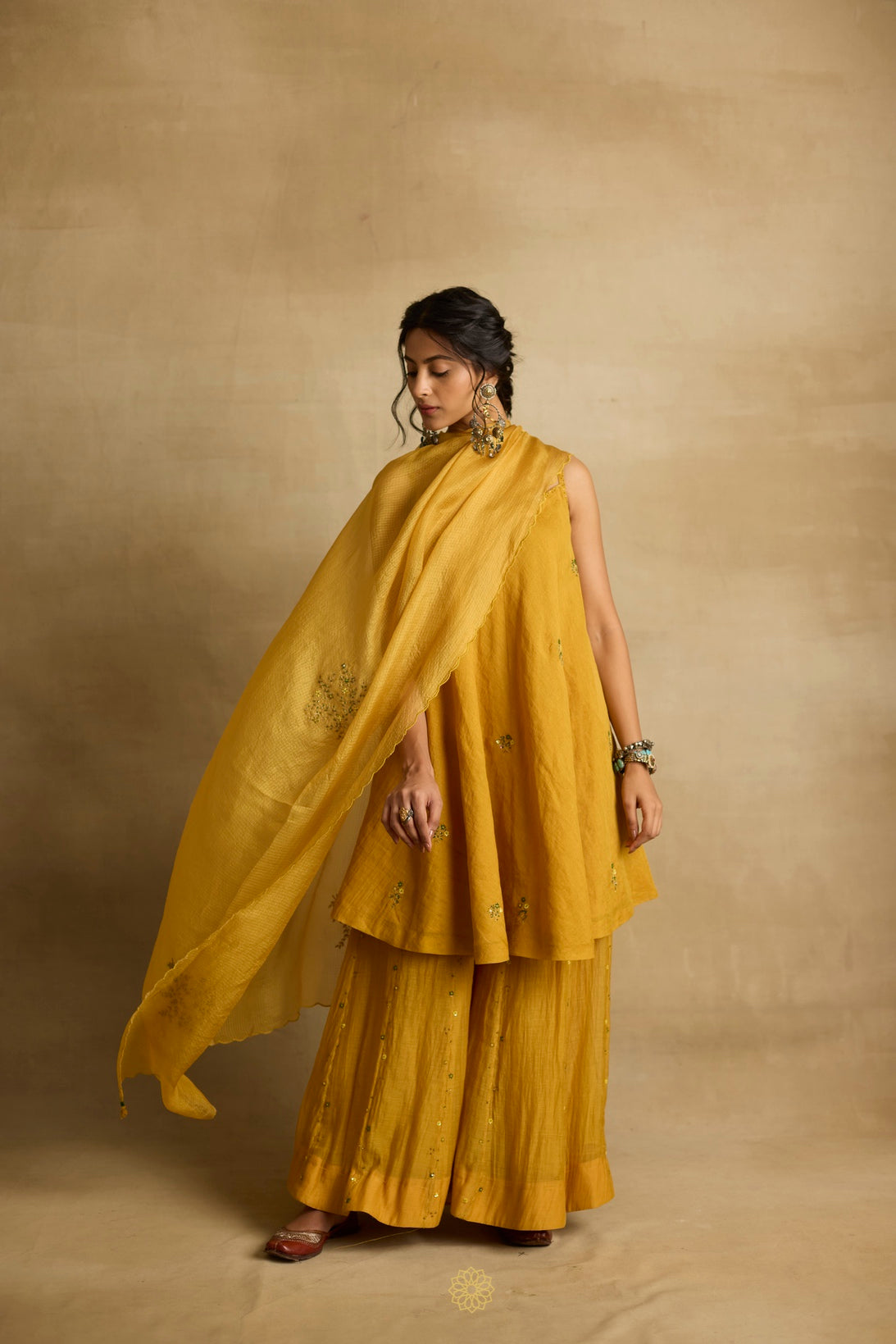 Freya – Golden yellow tissue chanderi strapped kurta and sharara paired with kota silk dupatta, hand crafted ari and zardozi embroidery