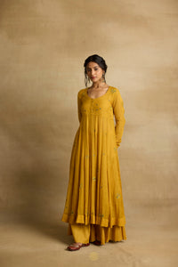 Meher – Golden yellow tissue chanderi Anarkali sharara set paired with mauve kota silk dupatta, handcrafted ari and zardozi embroidery