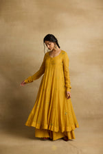 Load image into Gallery viewer, Meher – Golden yellow tissue chanderi Anarkali sharara set paired with mauve kota silk dupatta, handcrafted ari and zardozi embroidery
