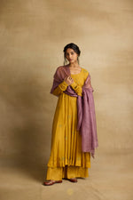 Load image into Gallery viewer, Meher – Golden yellow tissue chanderi Anarkali sharara set paired with mauve kota silk dupatta, handcrafted ari and zardozi embroidery
