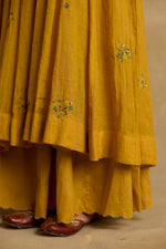 Load image into Gallery viewer, Meher – Golden yellow tissue chanderi Anarkali sharara set paired with mauve kota silk dupatta, handcrafted ari and zardozi embroidery
