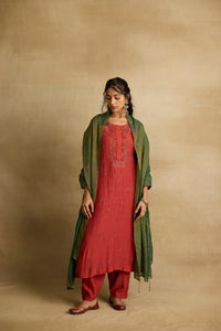 Naira - Brick rust mul chanderi kurta with salwar paired with a green kota silk dupatta