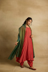 Naira - Brick rust mul chanderi kurta with salwar paired with a green kota silk dupatta