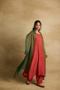 Naira - Brick rust mul chanderi kurta with salwar paired with a green kota silk dupatta