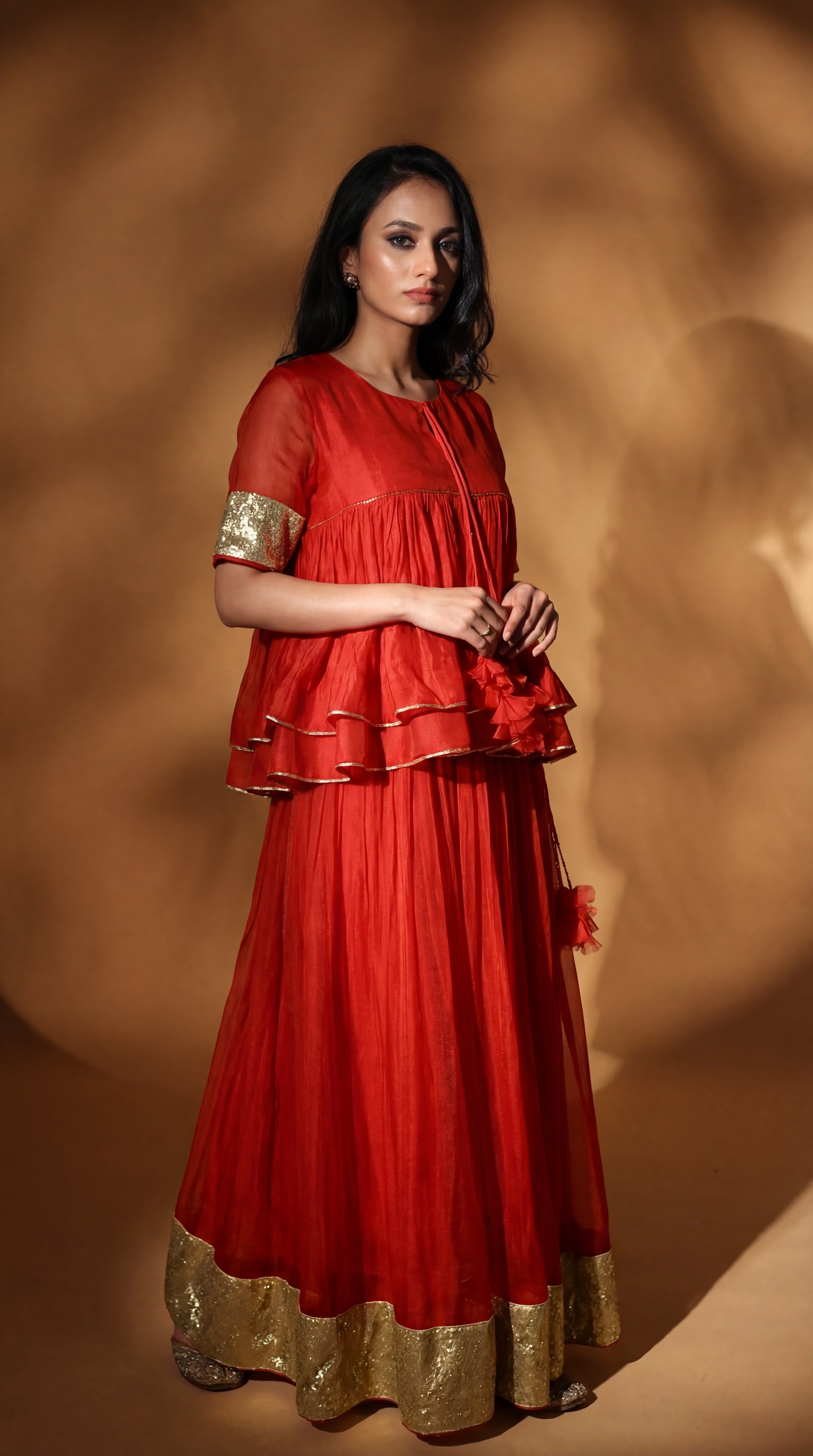 Nidhi | Burnt Orange Organza silk Lehenga with Gota and Ari-Zardozi Embroidery