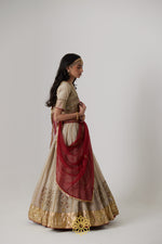 Load image into Gallery viewer, Kashvi - A soft gold benarasi handcrafted silk tissue lehenga and benarasi silk tissue blouse
