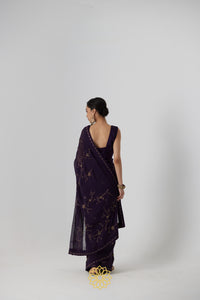 Yutika - An aubergine chiffon hand embroidered chiffon saree with tonal satin silk blouse