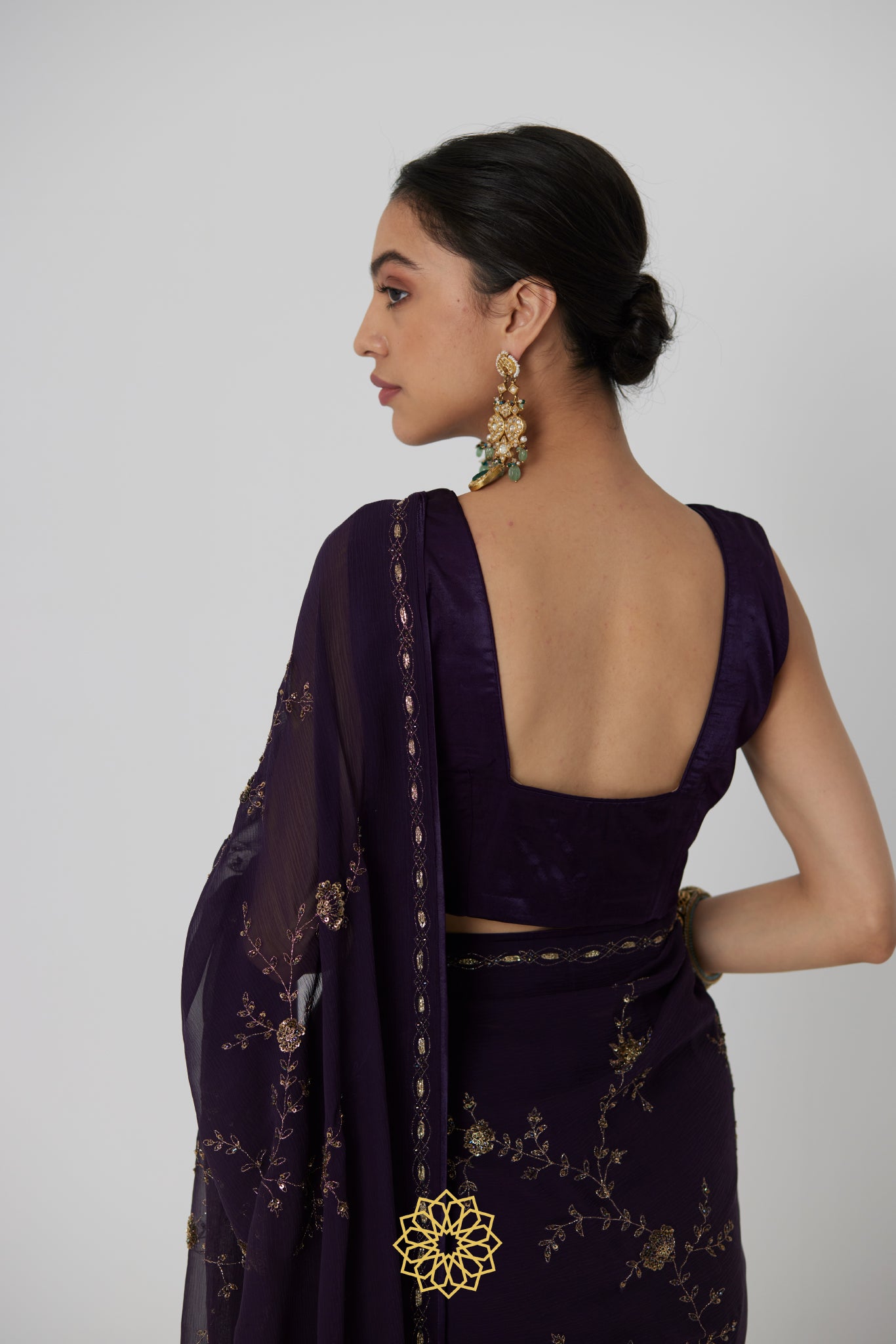 Yutika - An aubergine chiffon hand embroidered chiffon saree with tonal satin silk blouse